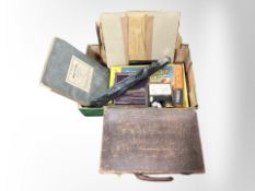A vintage briefcase and a further box containing vintage championship table tennis game,