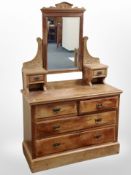 A late Victorian satinwood four-drawer mirror-back dressing table, 107cm x 50cm x 174cm.