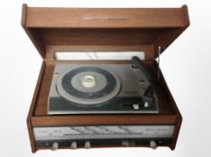 An Eltra teak-cased record player with Monarch turntable (continental plug).