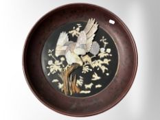 A Japanese Shibayama lacquered circular panel, diameter 46cm.