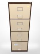 A four-drawer metal filing cabinet, 47cm x 63cm x 132cm.