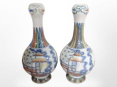 A pair of 20th century Chinese porcelain famile verte baluster vases,