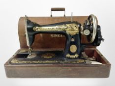 A Singer hand sewing machine, No. Y9795398.