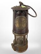 An Eccles Protector miner's lamp.