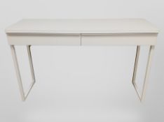 A contemporary white-gloss two-drawer rectangular table, 120cm x 41cm x 74cm.