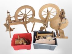 A group of pine spinning wheels and related items.