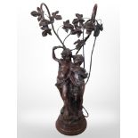 A resin figural table lamp, height 74cm.