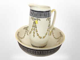 A 19th-century Royal Doulton pottery wash jug and basin.