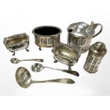 Two silver caddy spoons, together with a further EPNS spoon, a cruet set, and a pair of salts.