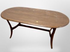 An Ercol oval coffee table, 115cm x 59cm 47cm.