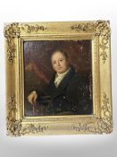British school (early 19th century) : Half-length portrait of a seated gentlemen wearing a buttoned