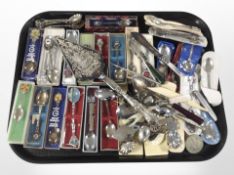 A large quantity of collector's spoons, other cutlery, crown, folding pocket knives, etc.