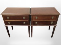 A pair of reproduction of reproduction mahogany bedside stands fitted two drawers,
