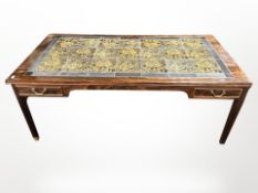A 20th-century Danish rosewood effect and tile-topped rectangular coffee table fitted two drawers,