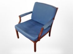 A 20th-century Danish armchair in blue fabric.