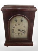 A Westminster chime mantel clock with silvered dial, height 37cm.