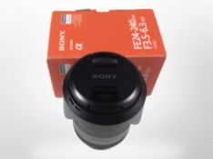 A Sony Alpha FE 24-240mm F3.5-6.3 OSS lens in box.