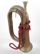 A brass and copper bugle.