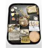 A collection of coins, badges, antique compass, bookmark, A R P and Acme whistles, etc.