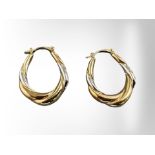 A pair of two-tone 9ct yellow gold earrings. CONDITION REPORT: 2.6g.
