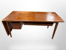A 20th-century Danish teak drop-leaf extending coffee table with under-shelf storage,