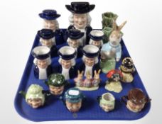 A group of ceramics including Quaker money box, sifters and Toby jugs, miniature teapots,