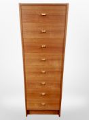 A 20th-century Danish teak eight-drawer chest, 46cm x 41cm x 137cm.