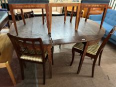 An early 20th-century oak extending dining table, length 166cm,