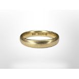 An 18ct gold band ring, size K CONDITION REPORT: 4.