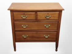 An Edwardian satinwood four-drawer chest, 91cm x 45cm x 85cm.