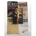 Four vintage paperback James Bond books, and a further book by James Hadley Chase.