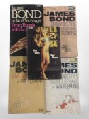 Four vintage paperback James Bond books, and a further book by James Hadley Chase.