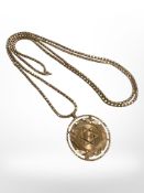 A 9ct gold disc pendant on chain. CONDITION REPORT: 15.5g.