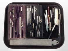 A group of precision drawing instruments,