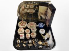 A brass and glass trinket display stand, together with assorted miniature crystal ornaments,