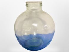 A glass carboy,