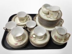 Approximately 33 pieces of early 20th-century floral-decorated tea china.