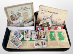 A large quantity of cigarette cards in albums