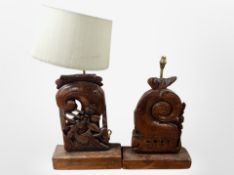 Two Eastern heavily carved table lamps, one with shade,