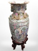 A 20th century Cantonese porcelain baluster vase on carved hardwood stand,