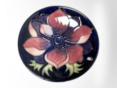 A Moorcroft pin dish, diameter 12cm.