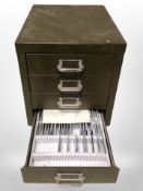 A metal four drawer index chest containing slides,