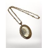 A large 9ct gold locket on belcher link chain. CONDITION REPORT: 47.7g gross.