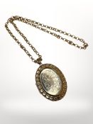 A large 9ct gold locket on belcher link chain. CONDITION REPORT: 47.7g gross.
