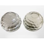 A large pair of faceted crystal spherical paperweights, each 11cm.