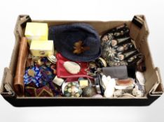 A box of various items, compacts, bead work items, sea shells,