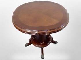 A reproduction mahogany coffee table,