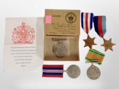 A group of Second World War medals, in box of issue addressed to R Miles of Ilkeston.