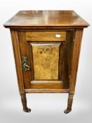 A Victorian walnut pot cupboard,