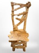 A contemporary driftwood chair,